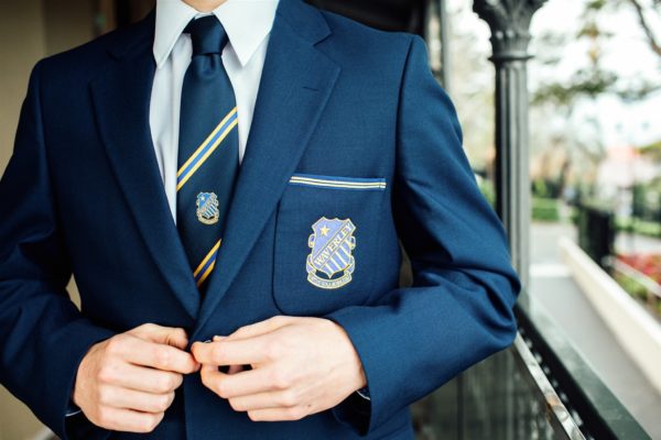 Student wearing the new academic uniform